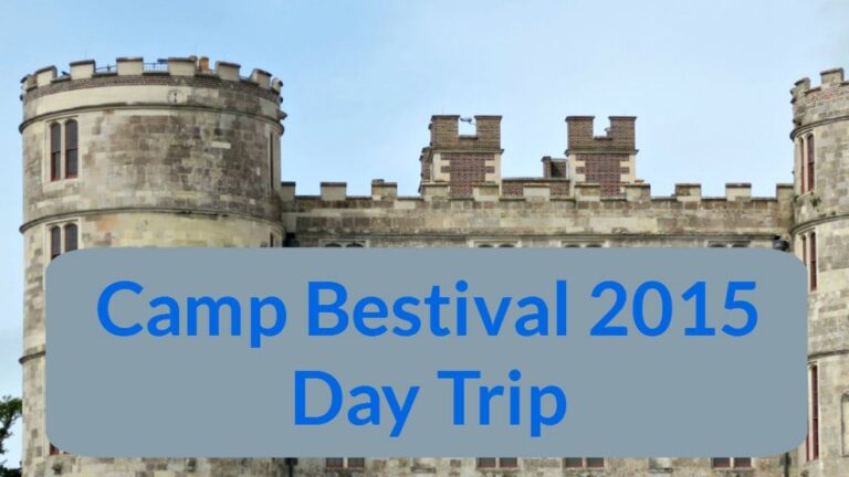 A stone castle with round towers stands under a blue sky. Overlaid text reads: “Camp Bestival 2015 Day Trip” in large blue letters on a grey background strip, capturing the excitement of the Camp Bestival day trip adventure.