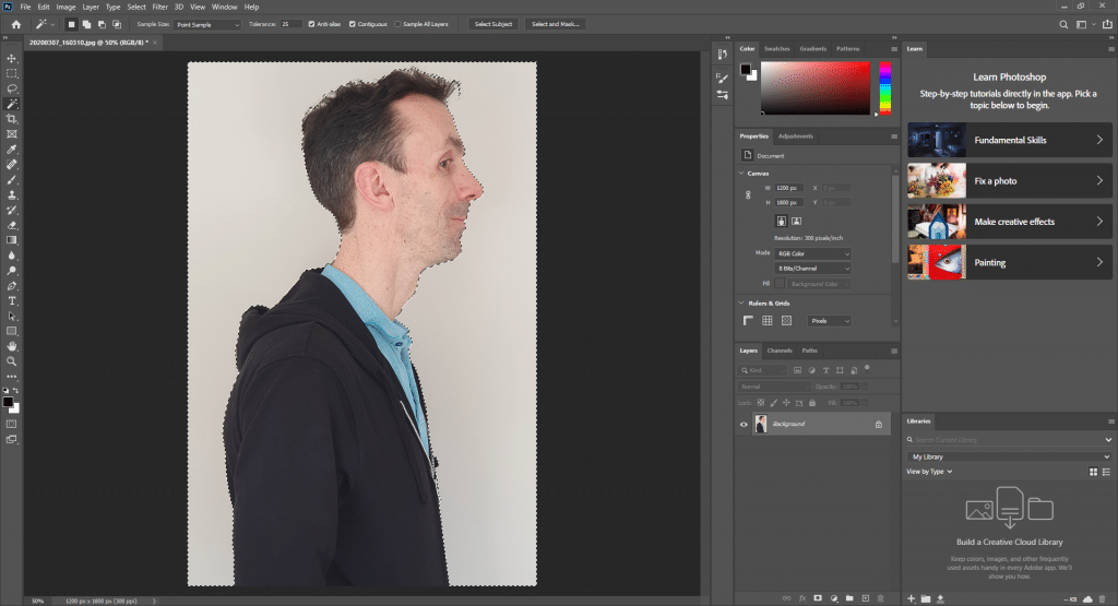 A man in a black hoodie is shown in profile against a white background in Adobe Photoshop, with editing tools and adjustment panels visible on the right side—perfect for creating Personalised Silhouette Prints.