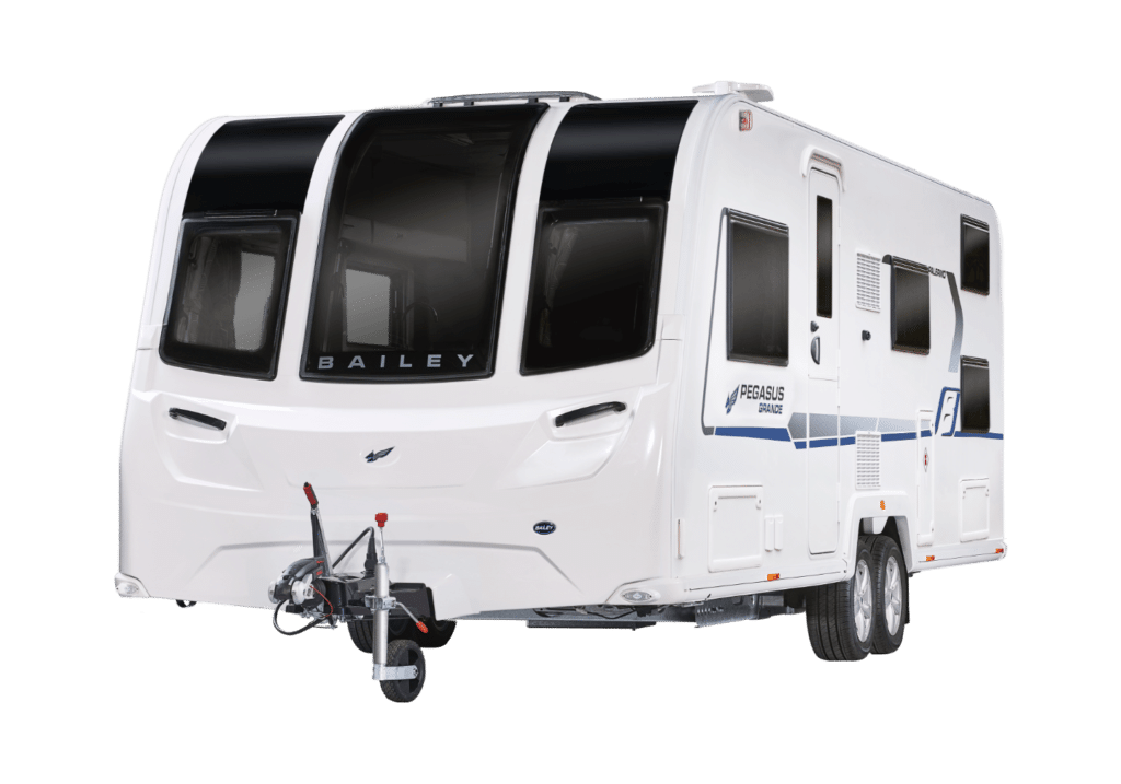 A modern white 6 berth touring caravan with large tinted windows, twin axles, and Bailey branding on the front. It features a side door and blue accents, designed for towing behind a vehicle.